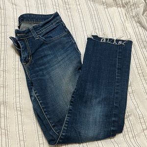 Levi’s the original Jean mid rise skinny size 4 raw hem dark blue wash